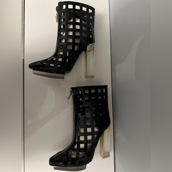 Versace Boots 
Glamorous and stylistic. This statement piece was  worn once. - Picture 4 of 12